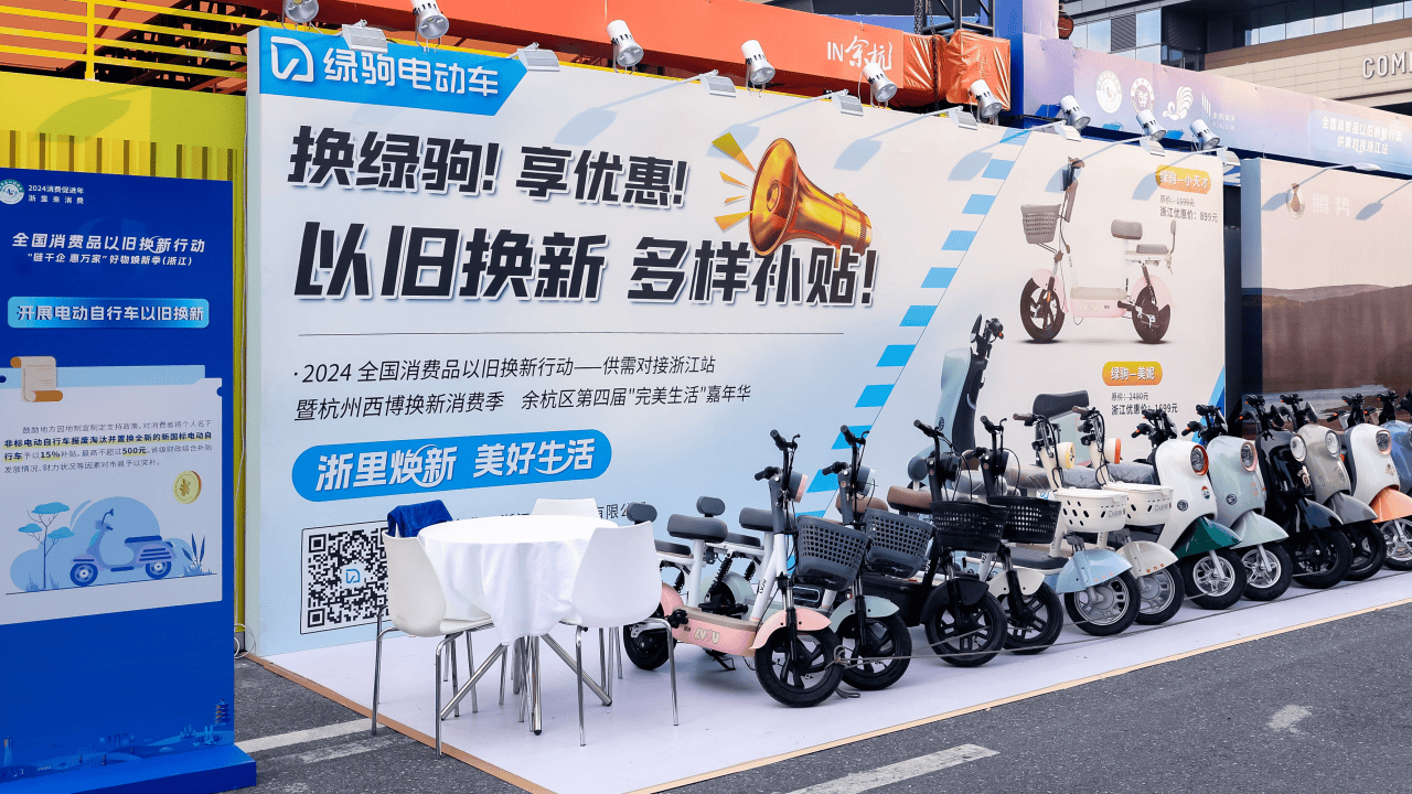 Electric scooter display in Cambodia store showcasing various models and promotional banners for eco-friendly transportation options.